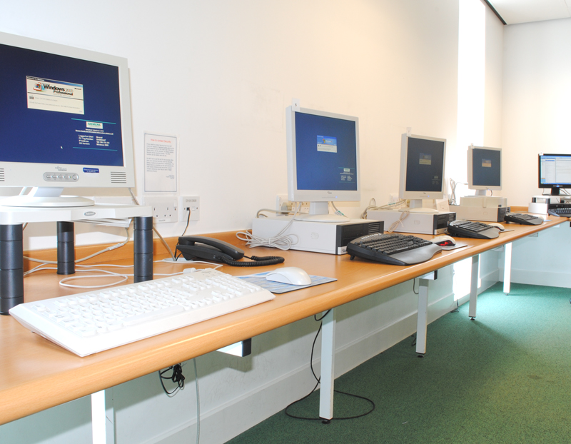 RGUC IT Room showing computers on desks.